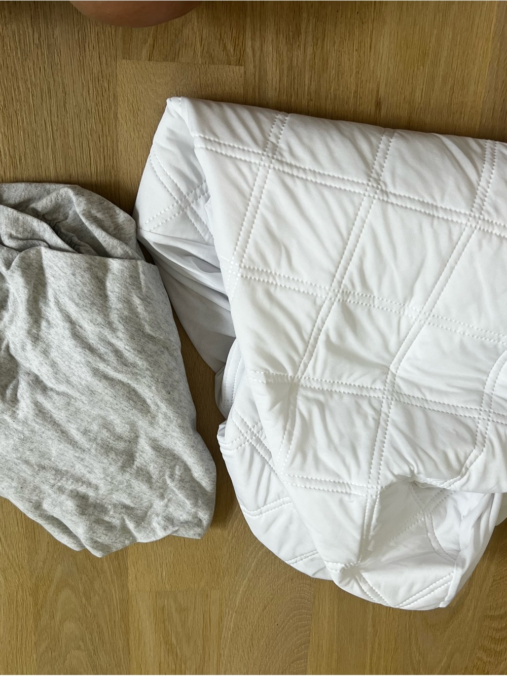 Crib sized - White Quilted waterproof Mattress Pad - and Jersey bed sheet cover